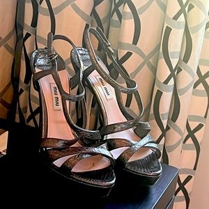 I am selling a pair of size 10 Miu miu shoes